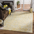 Ivory Gold Bordered Area Rug 10' x 14' E737621